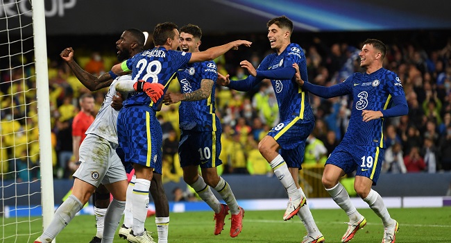 Chelsea players celebrate after winning the UEFA