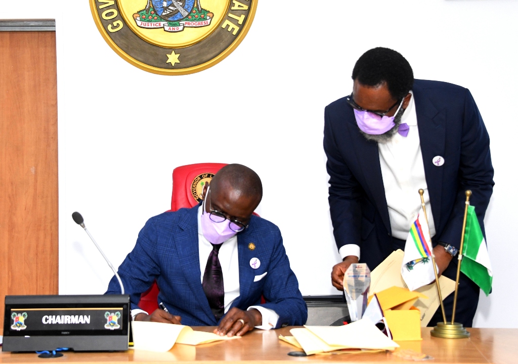 Lagos State Governor, Mr. Babajide Sanwo-Olu signing the Anti-Open grazing bill into law With him is the Attorney General and Commissioner for Justice, Mr. Moyosore Onigbanjo (SAN)