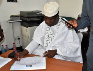 SenateSenator Michael Opeyemi Bamidele signing Documents at the APC Secretariat Abuja
